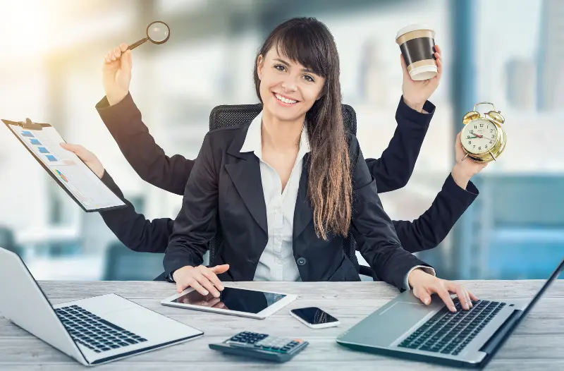 Multitask business woman with many hands. Performing several actions at the same time.
