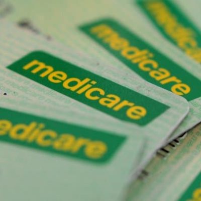 pile-green-medicare-cards